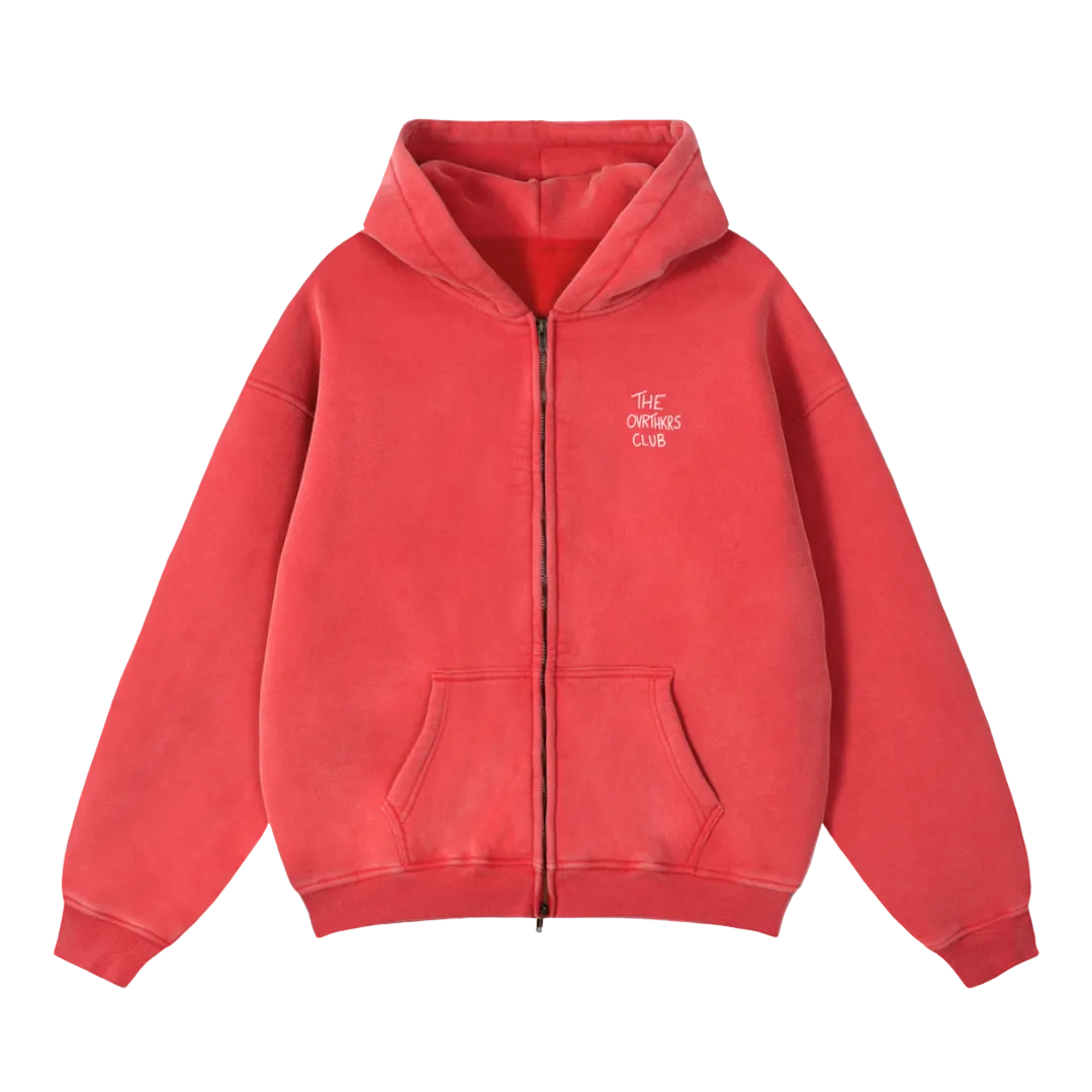 Red hoodie with a small white logo on a dark green background