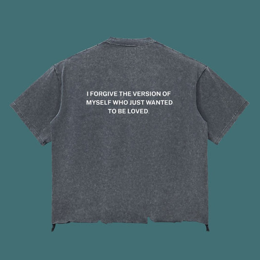 Gray t-shirt with a motivational quote on the back against a transparent background
