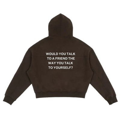 Brown hoodie with text on the back against a solid background