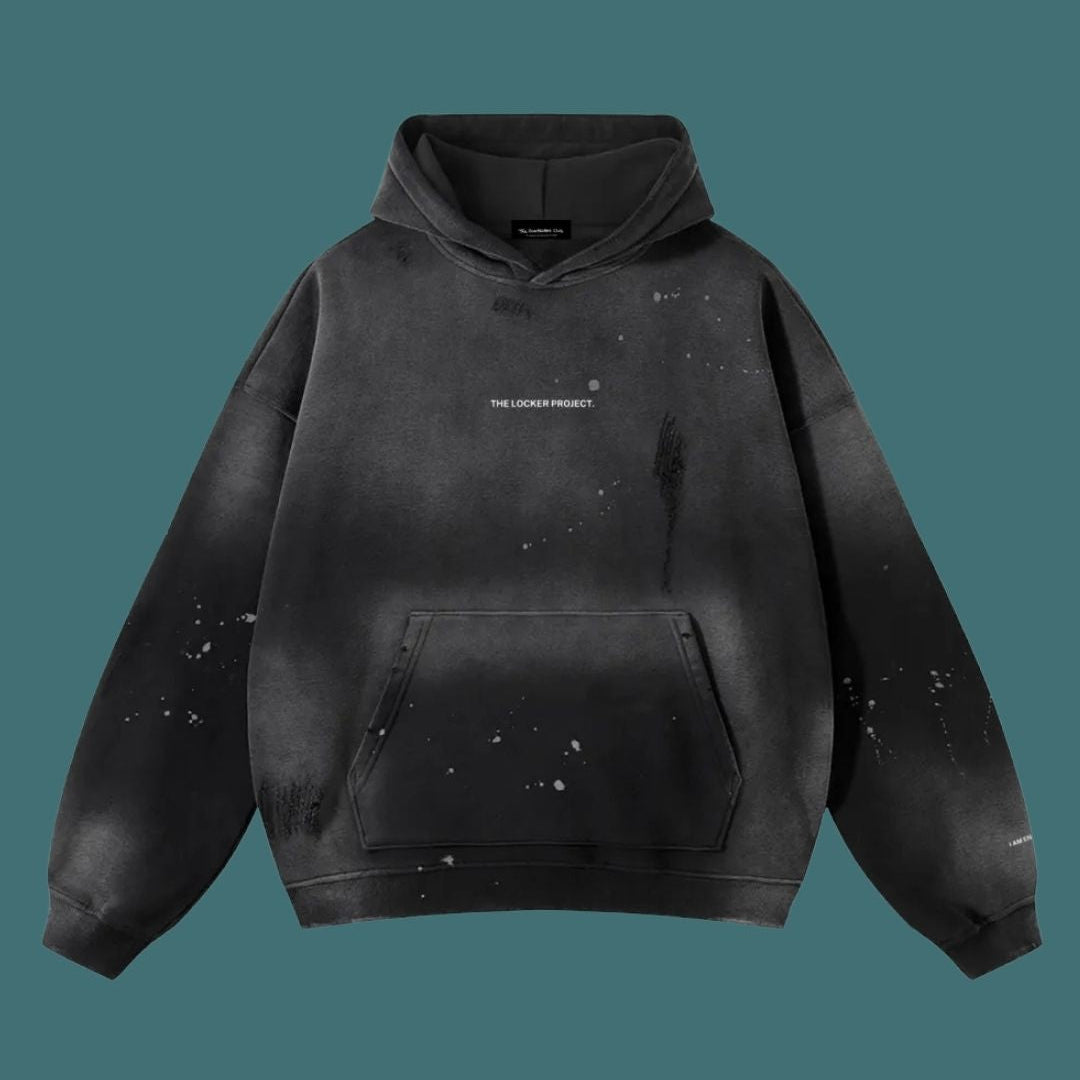 Black hoodie with splatter design on a transparent background