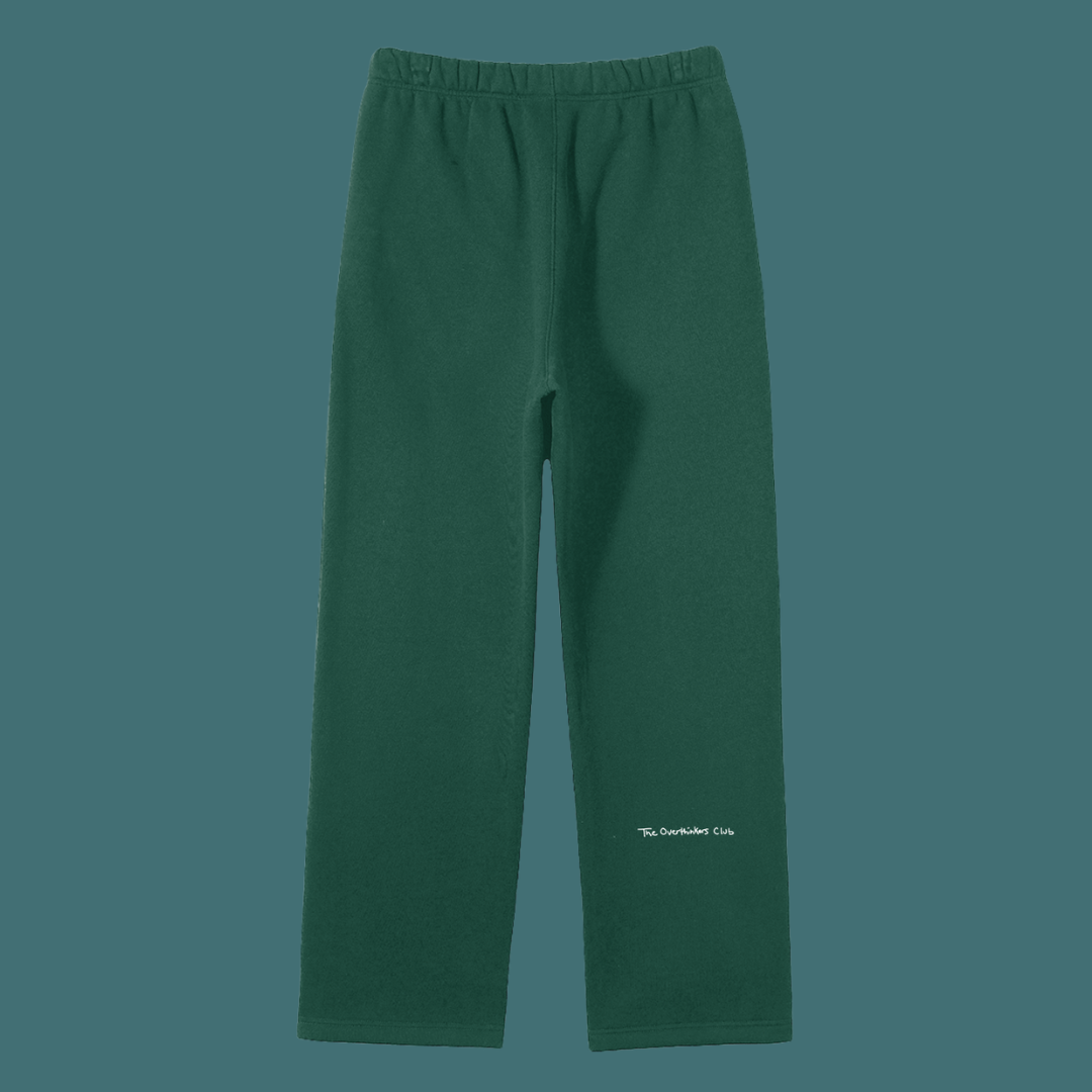 Green pants with a brand logo on a solid background
