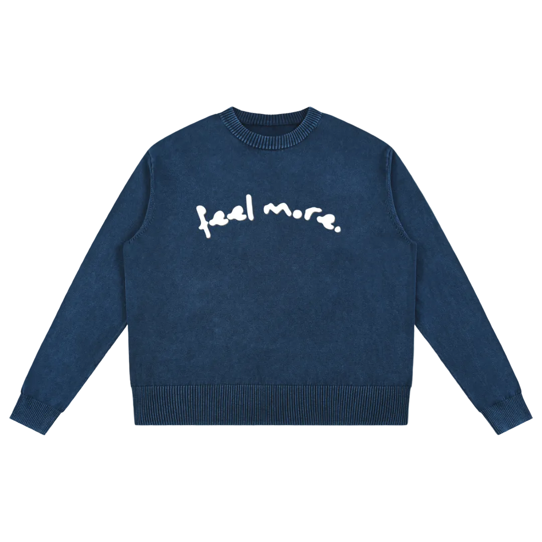 Navy blue sweater with 'feel more' text on a transparent background