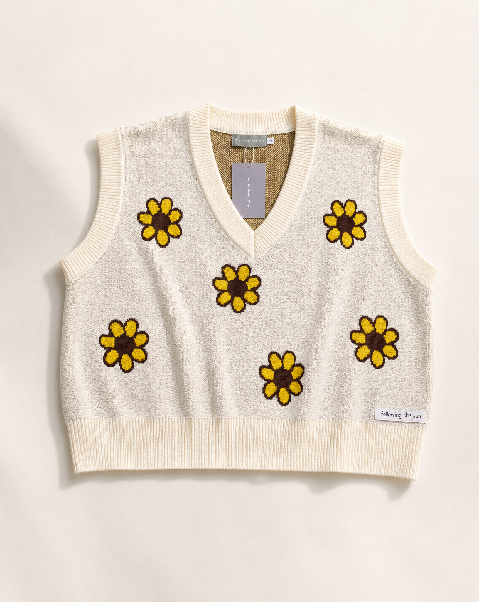 Following the Sun Knit Vest — front, sunflower motif, open-weave knit construction | Overthinkers Club