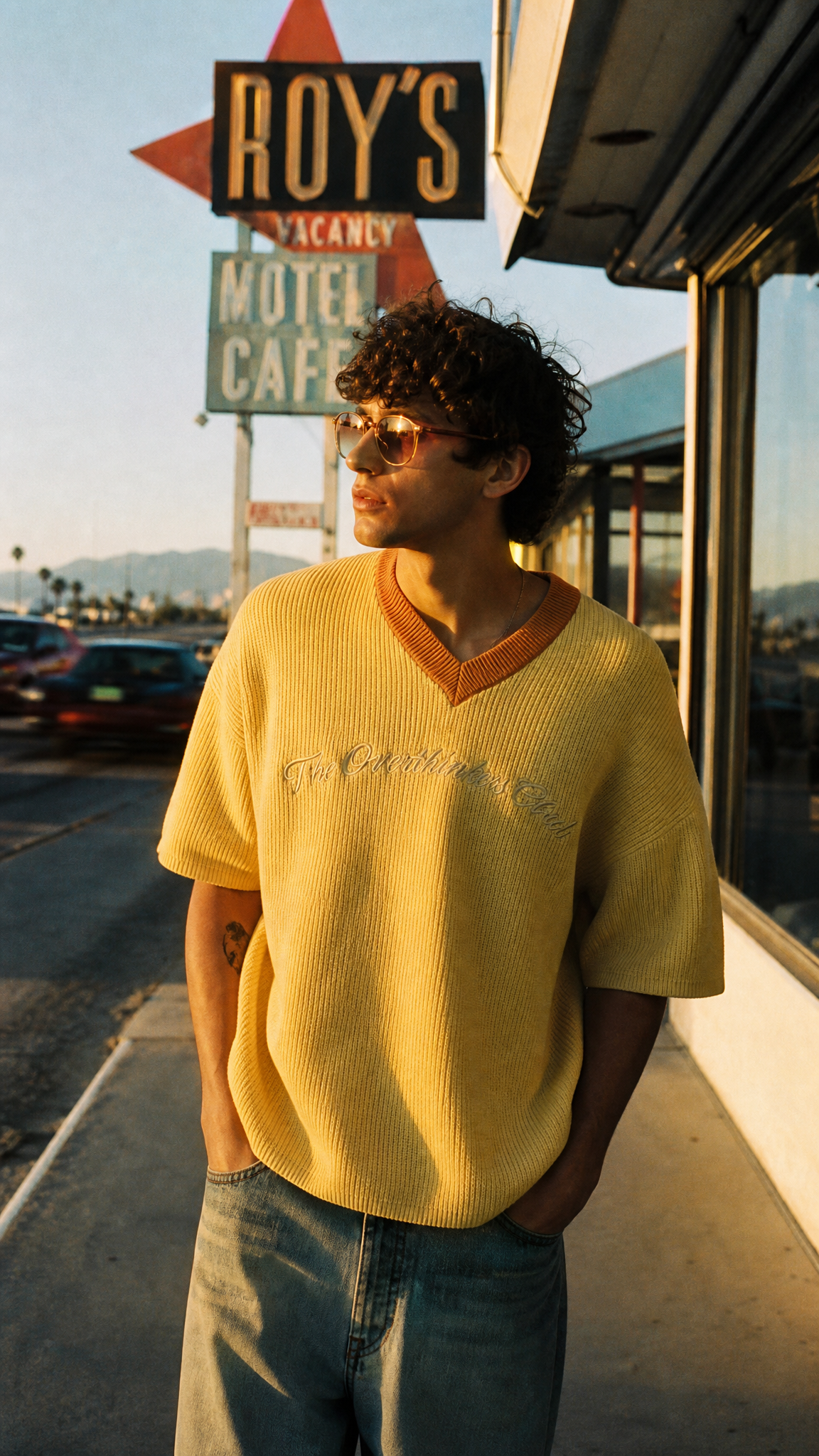Still Here Jersey — close-up of knitted logo and rib detail | Overthinkers Club