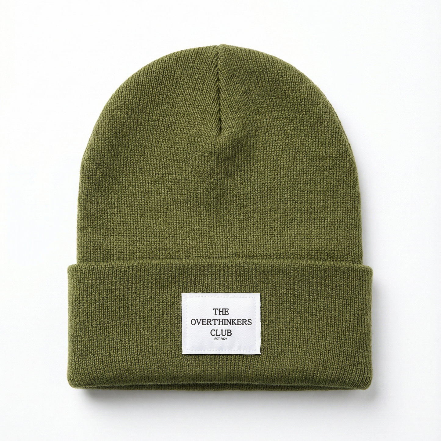 Green beanie with a label on a white background