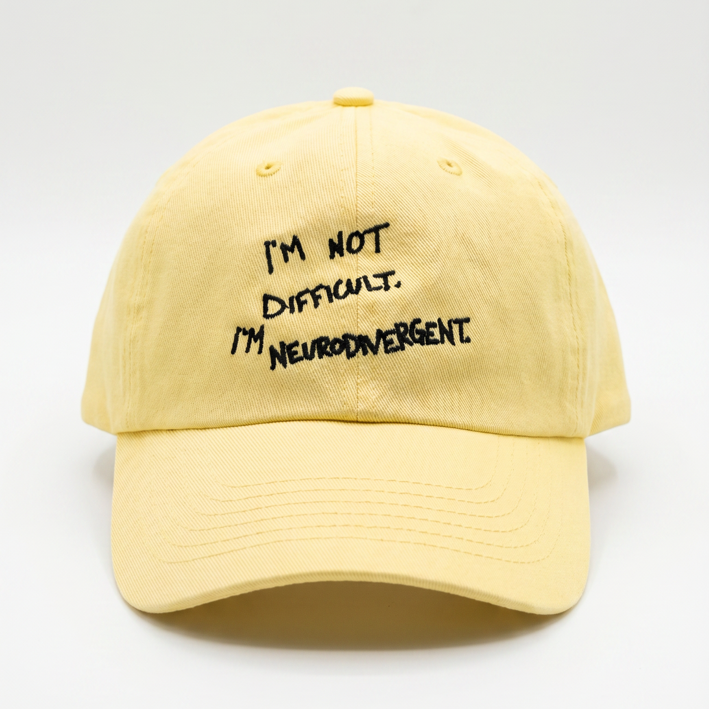 Butter yellow I'm Not Difficult I'm Neurodivergent Dad Hat — front, embroidered text | Overthinkers Club