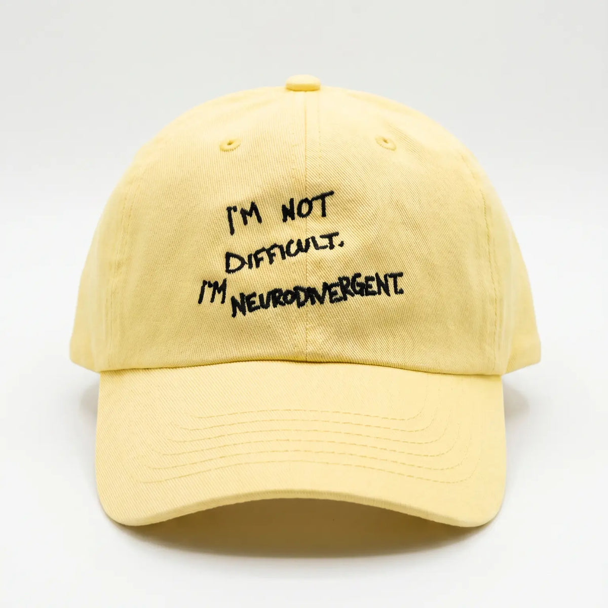 Butter yellow I'm Not Difficult I'm Neurodivergent Dad Hat — front, embroidered text | Overthinkers Club