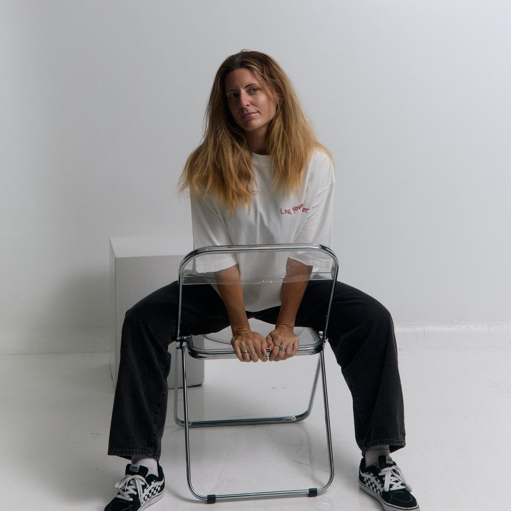 Love Yourself First Box Cut Tee — flat lay back, hemline detail | Overthinkers Club