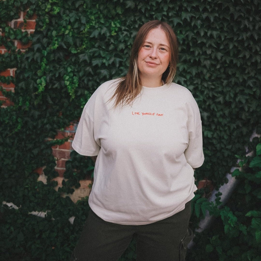 Love Yourself First T-Shirt — back view, white organic cotton | Overthinkers Club