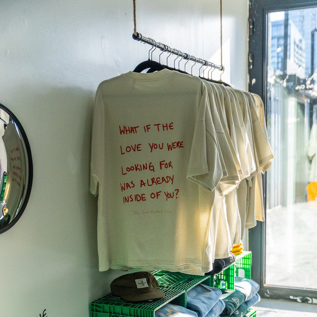 Love Yourself First T-Shirt — model wearing, relaxed fit side view | Overthinkers Club