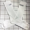 Overthinker Crew Socks — worn on foot lifestyle shot, white ribbed cotton | Overthinkers Club